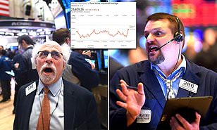 Two Wall Street floor traders with anxious expressions over market movement.
