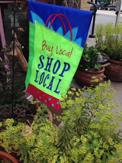 Buy Local Shop Local sign outside small business